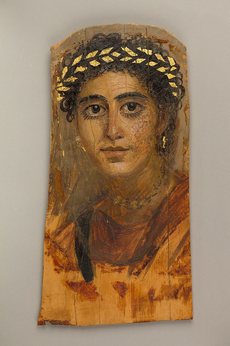 Roman period painted portrait of a young woman in red wearing a gold wreath and jewellery, Metropolitan Museum of Art